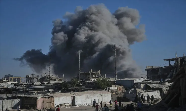 Israeli strikes and tank fire cause the smoke rises following an Israeli military strike in Gaza City.