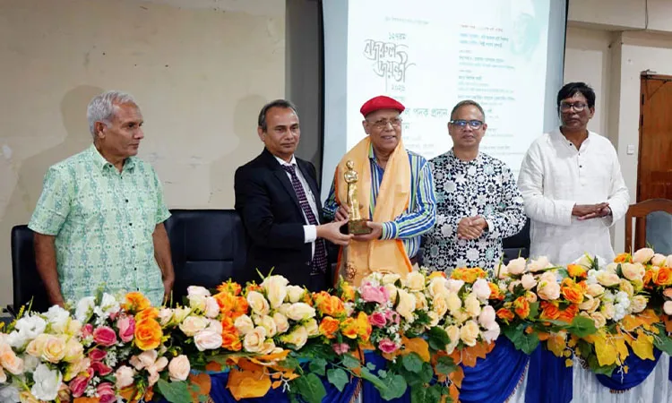 Vice-Chancellor Professor Dr. Mohammad Mosharraf Hossain formally presented the award to researcher Abdul Hai Sikder.