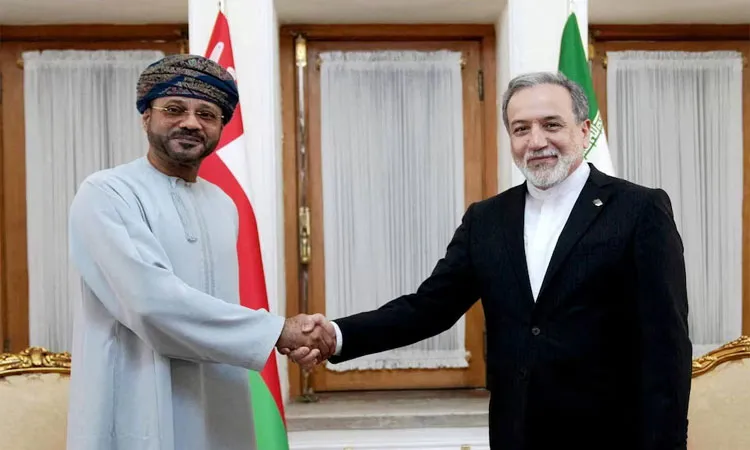 Iran's Foreign Minister Abbas Araghchi meets with Oman's Foreign Minister Sayyid Badr al-Busaidi in Tehran.