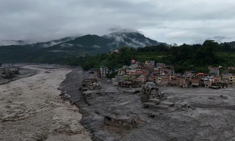 A drone view shows mud covering properties following a flash flood in Trishuli, Nuwakot district, Nepal.