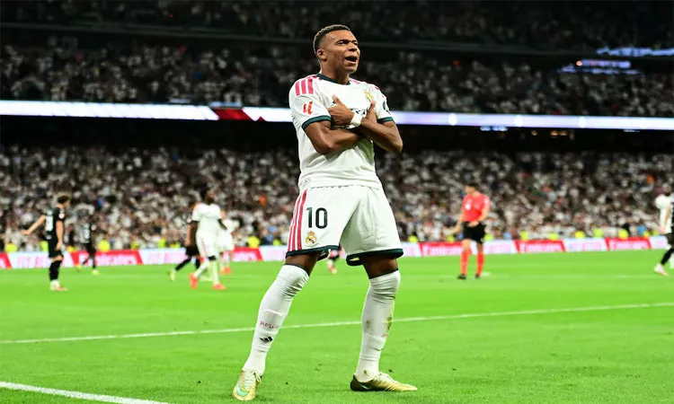 Kylian Mbappe celebrates scoring their second goal.
