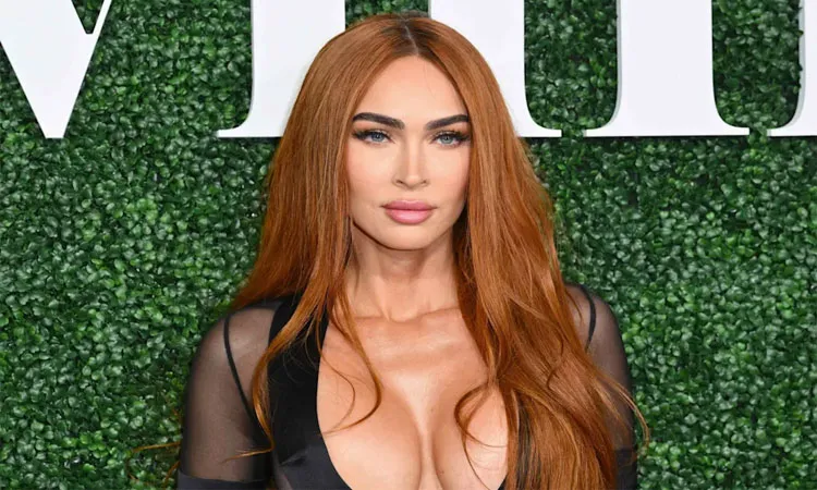 Megan Fox is ready for spooky season early with with debuting waist-length, jet-black hair in a new video.