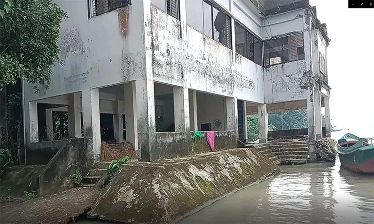 A portion of the West Deuri Government Primary School-cum-Cyclone Shelter in Jhalakathi has collapsed into the Bishkhali River.
