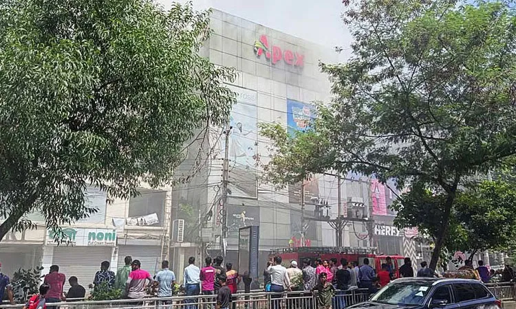 Firefighters are working to control a blaze at a six-storey Apex showroom in Dhanmondi.