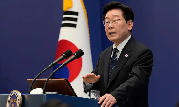 South Korean President Lee Jae Myung speaks during a press conference at the presidential Blue House in Seoul.