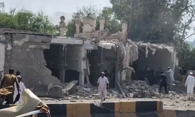 The coordinated assault began during Friday prayers when a suicide bomber rammed an explosive-laden vehicle into the facility's outer wall near a mosque.