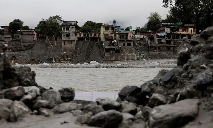 Damaged houses following deadly flash floods and a mudslide in Devighat, Nuwakot district, Nepal.