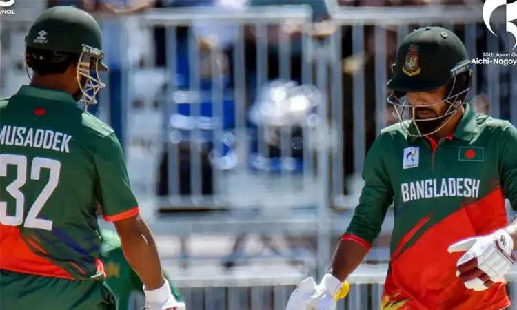 The match was cut to 13 overs per side because of a wet outfield.