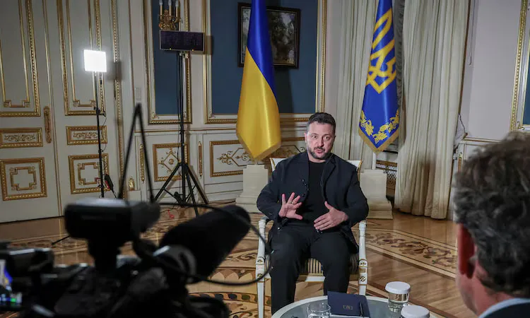 Ukraine's President Volodymyr Zelenskiy speaks during an interview with Reuters.