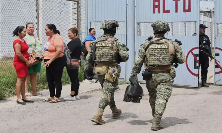 Local reports indicate prisoners used firearms during the clash.