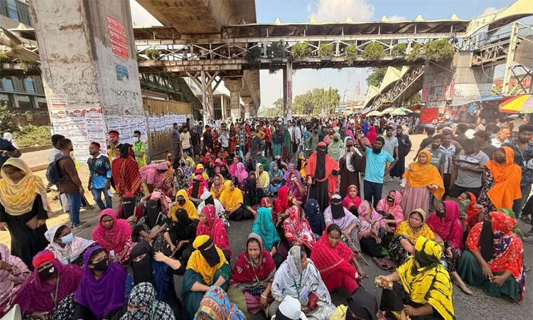 Garment workers block the Dhaka-Mymensingh highway in Uttara