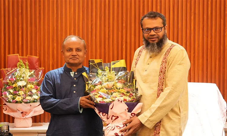 PSTU Vice-Chancellor Professor Dr. S. M. Hemayet Jahan welcomed Professor Dr. Obaidul Islam with a floral greeting.