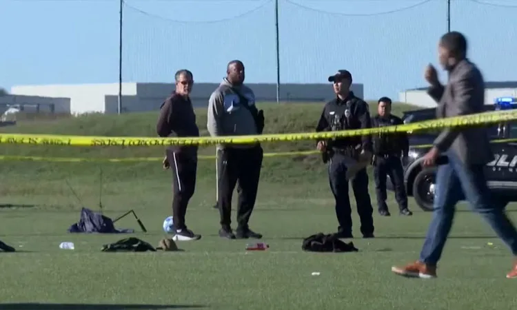 Police attend the scene where a vehicle drove through a Football game at the Stryker Sports Complex.
