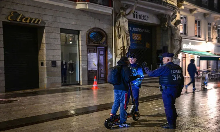 French authorities impose curfews in Paris, Nice and other cities