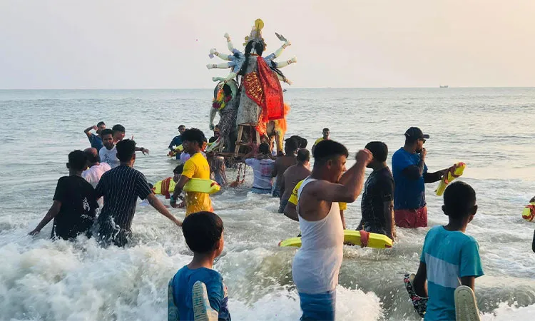 Thousands of devotees gathered at Cox’s Bazar beach for Bijoya Dashami to bid a reverent farewell to Goddess Durga.