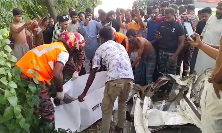 The crash occurred around 2:30 PM in the Arkandi area along the Dhaka-Khulna highway.