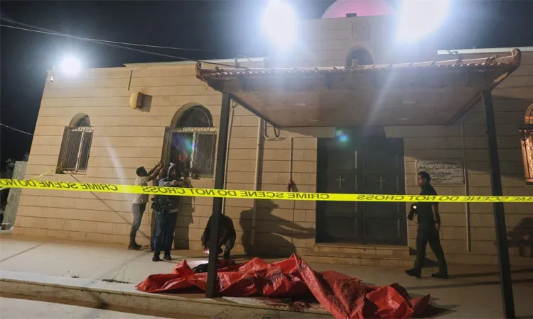 Outside a Greek Orthodox church cordoned off with crime scene tape hours after gunmen opened fire during a funeral in Hamoud village, in Jordan's Karak governorate.