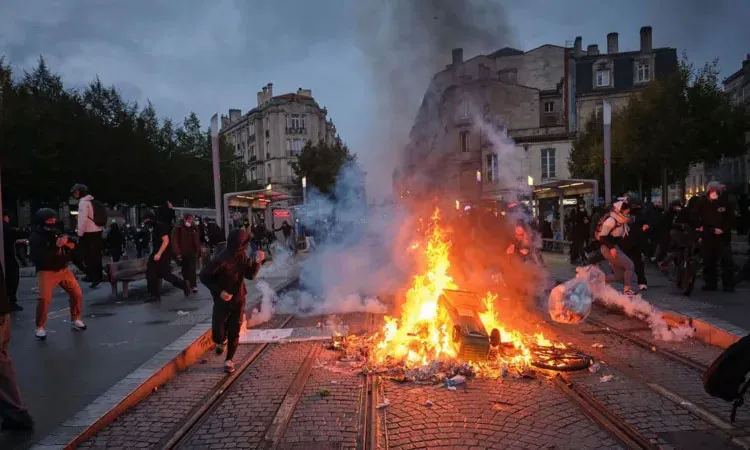In the southern port of Marseille, protesters erected makeshift street barricades and set them alight late on Saturday.