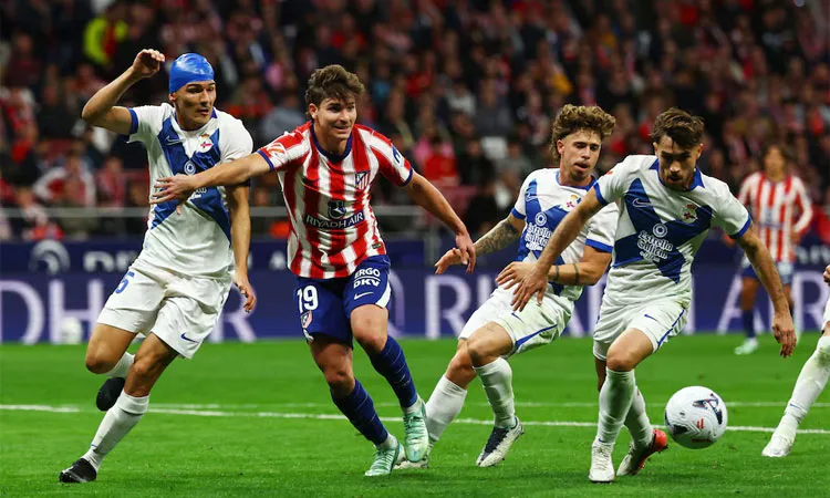 Madrid's Julian Alvarez celebrates scoring their first goal with Morten Hjulmand and Marc Pubill.