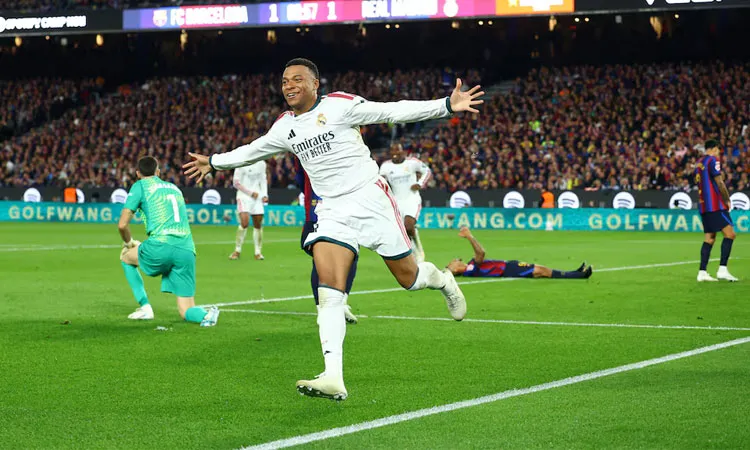 Real Madrid's Kylian Mbappe celebrates scoring their second goal.
