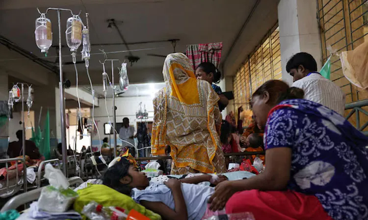 Dengue-infected children receive treatment at the Mugda Medical College and Hospital in Dhaka.